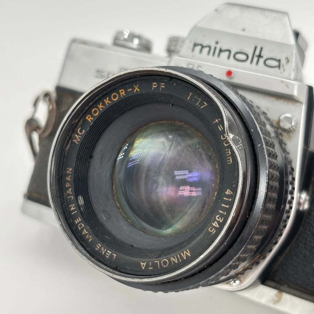 Minolta SRT 201 35mm SLR Film Camera with MC Rokkor-X PF 50mm f1.7 Lens Silver